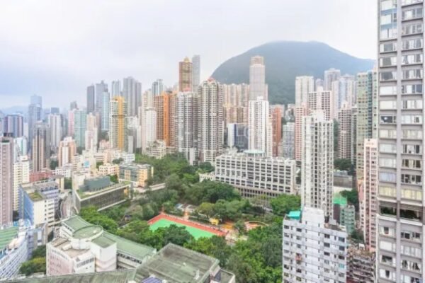 Hong Kong apartment block fire death toll jumps to 128, officials warn could rise further